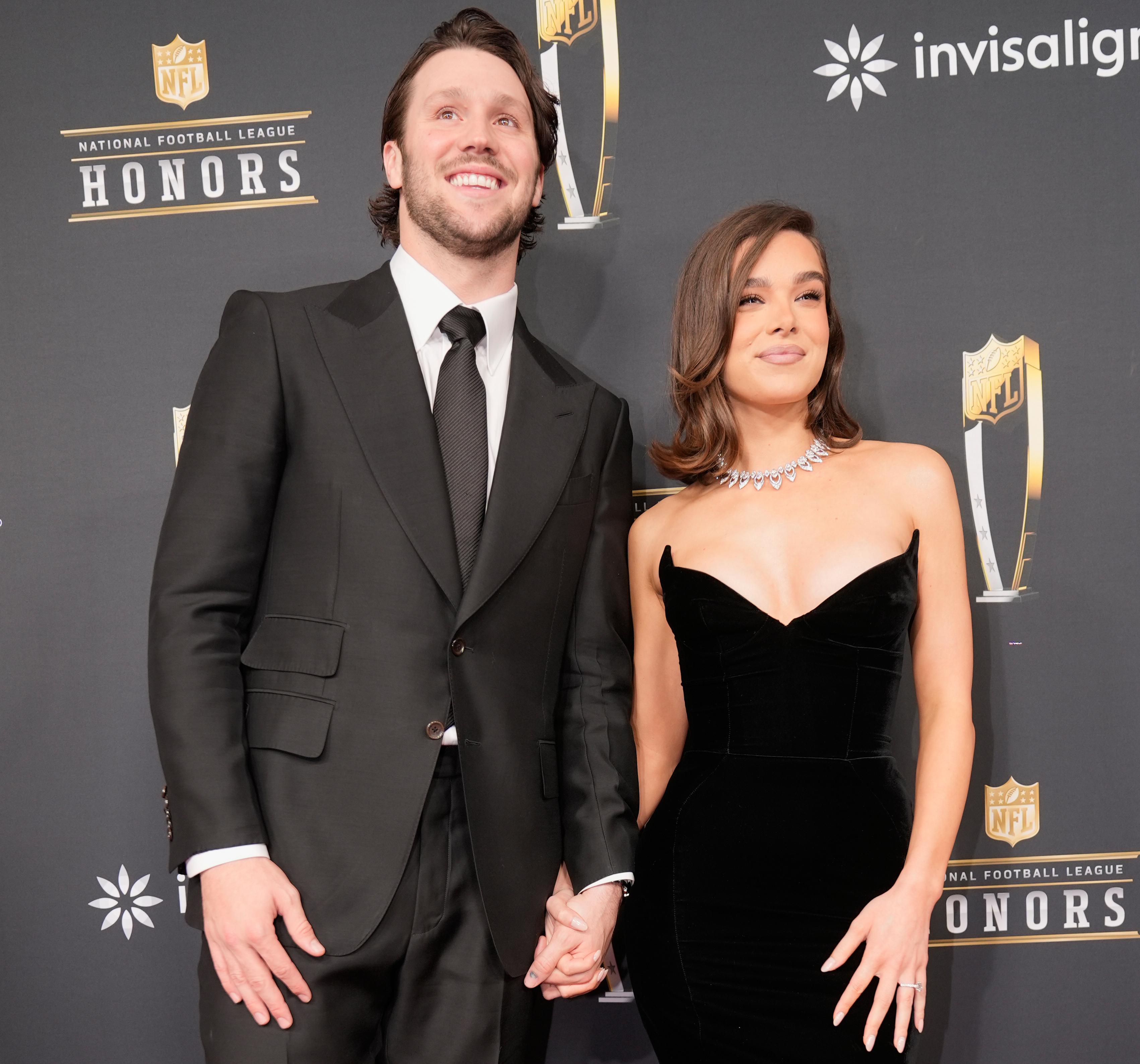 FILE - Josh Allen, of the Buffalo Bills, and his fiancé, Hailee Steinfeld, pose on the red carpet at the NFL Honors award show ahead of the Super Bowl 59 football game, Feb. 6, 2025, in New Orleans. (AP Photo/Gerald Herbert, File)