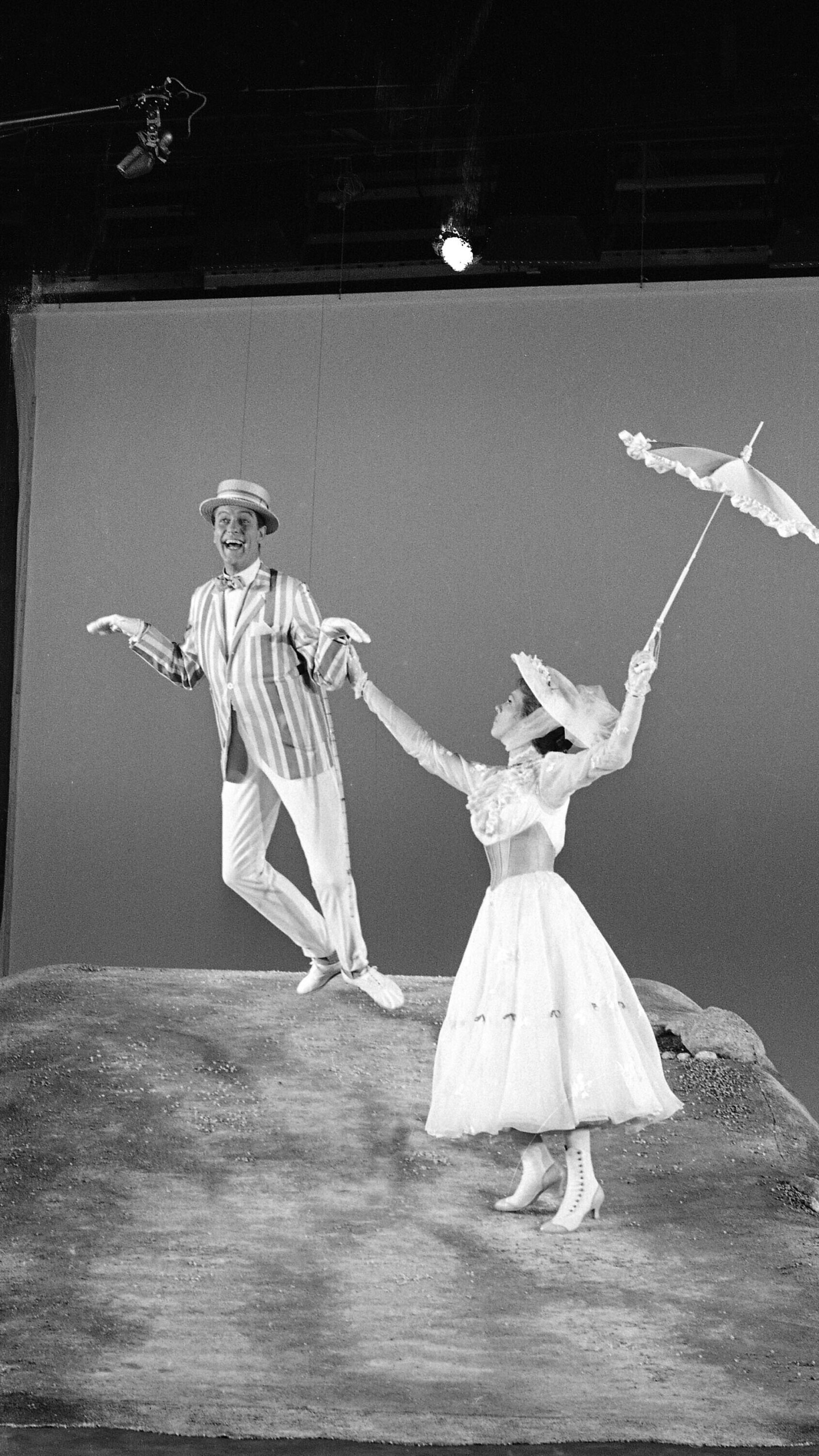 FILE - Dick Van Dyke and Julie Andrews dancing in a scene from the Disney movie " Mary Poppins" in Hollywood, Calif. June 25, 1963. (AP Photo/Don Brinn, File)