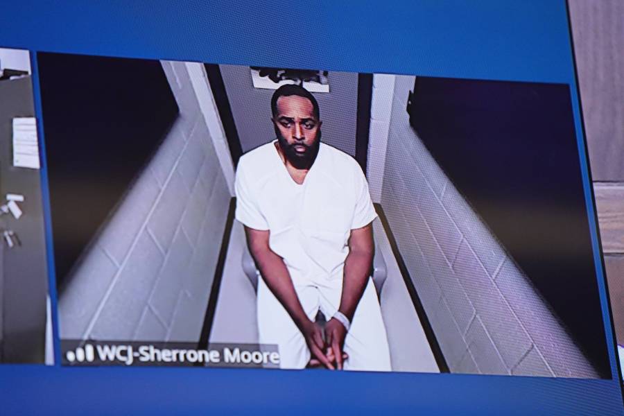 Fired Michigan football coach Sherrone Moore appears via video in court on Friday, Dec. 12, 2025 in Ann Arbor, Mich. (AP Photo/ Ryan Sun, Pool)