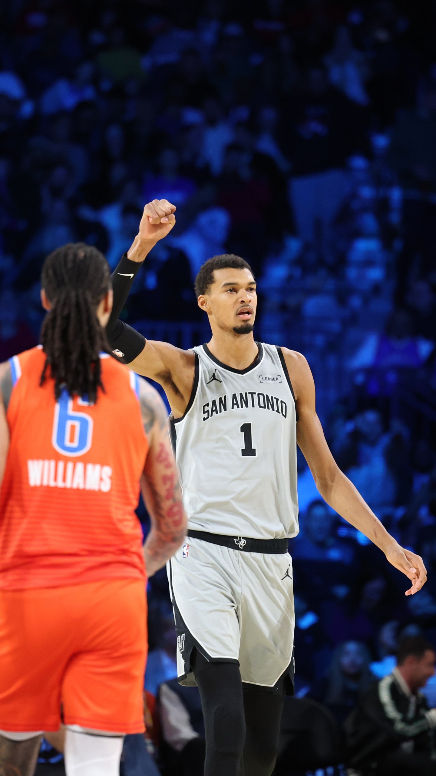 San Antonio Spurs forward Victor Wembanyama (1) reacts to scoring in the second half of an NBA Cup semifinals basketball game against the Oklahoma City Thunder, Saturday, Dec. 13, 2025, in Las Vegas. (AP Photo/Ronda Churchill)