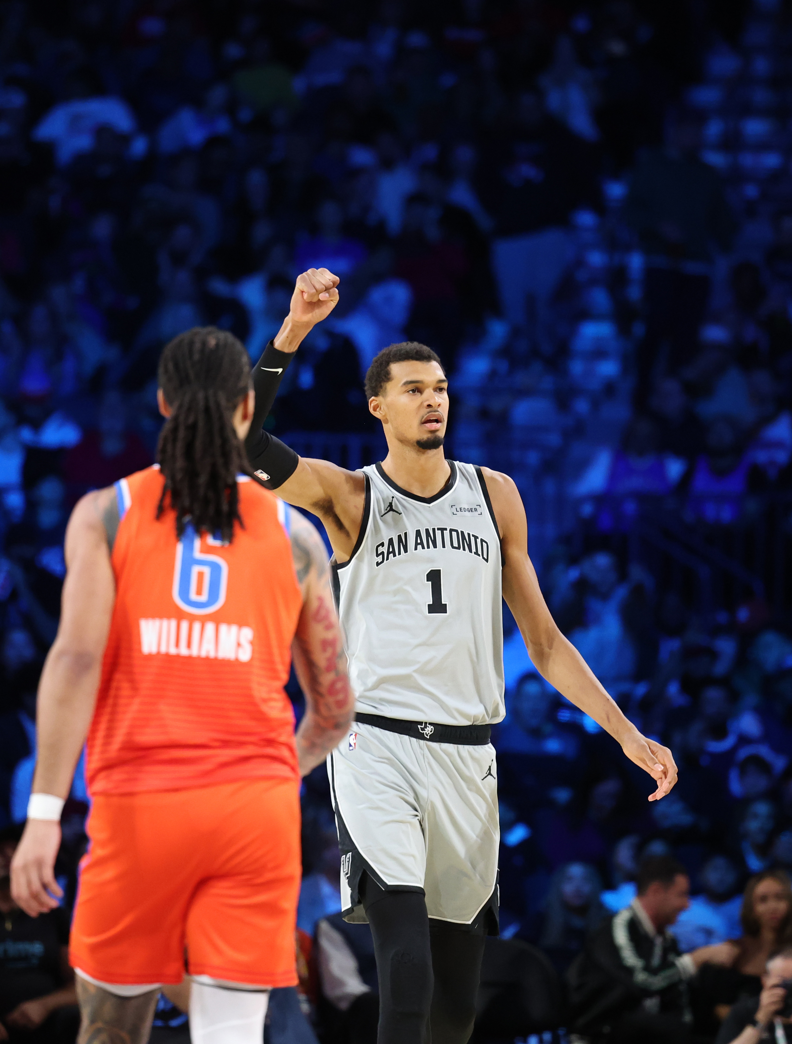 San Antonio Spurs forward Victor Wembanyama (1) reacts to scoring in the second half of an NBA Cup semifinals basketball game against the Oklahoma City Thunder, Saturday, Dec. 13, 2025, in Las Vegas. (AP Photo/Ronda Churchill)
