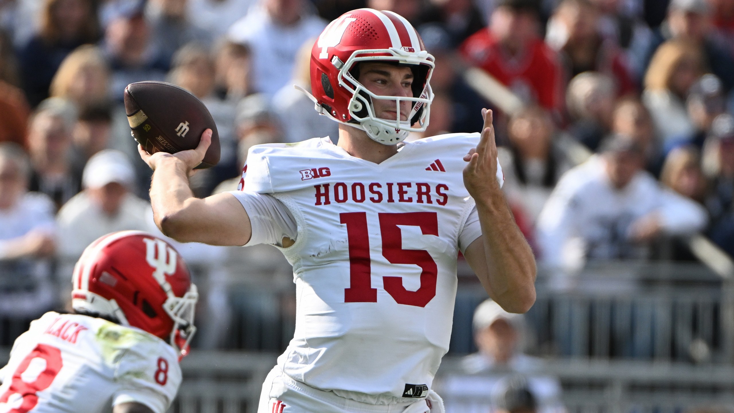 FILE - Indiana quarterback Fernando Mendoza (15) throws a pass during the first half of an NCAA college football game against Penn State , Saturday, Nov. 8, 2025, in State College, Pa. (AP Photo/Barry Reeger, File)