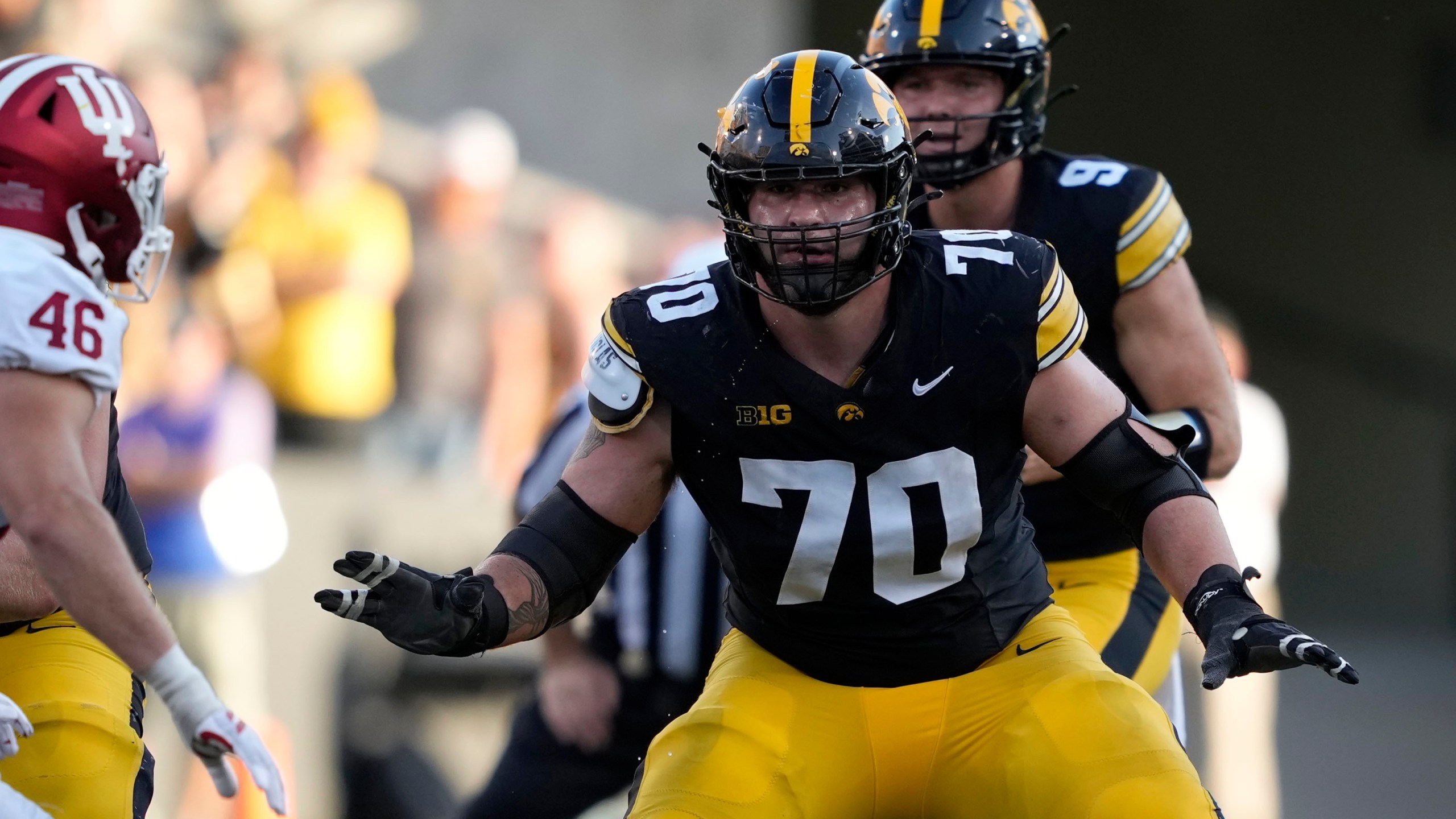 FILE - Iowa offensive lineman Beau Stephens (70) looks to make a block during the second half of an NCAA college football game against Indiana, Saturday, Sept. 27, 2025, in Iowa City, Iowa. (AP Photo/Charlie Neibergall, File)