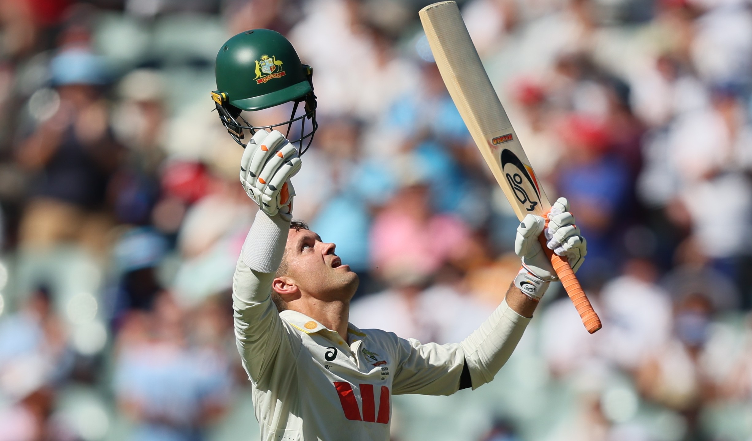Australia's Alex Carey celebrates his century during play on day one of the third Ashes cricket test between England and Australia at the Adelaide Oval in Adelaide, Australia, Wednesday, Dec. 17, 2025. (AP Photo/James Elsby)