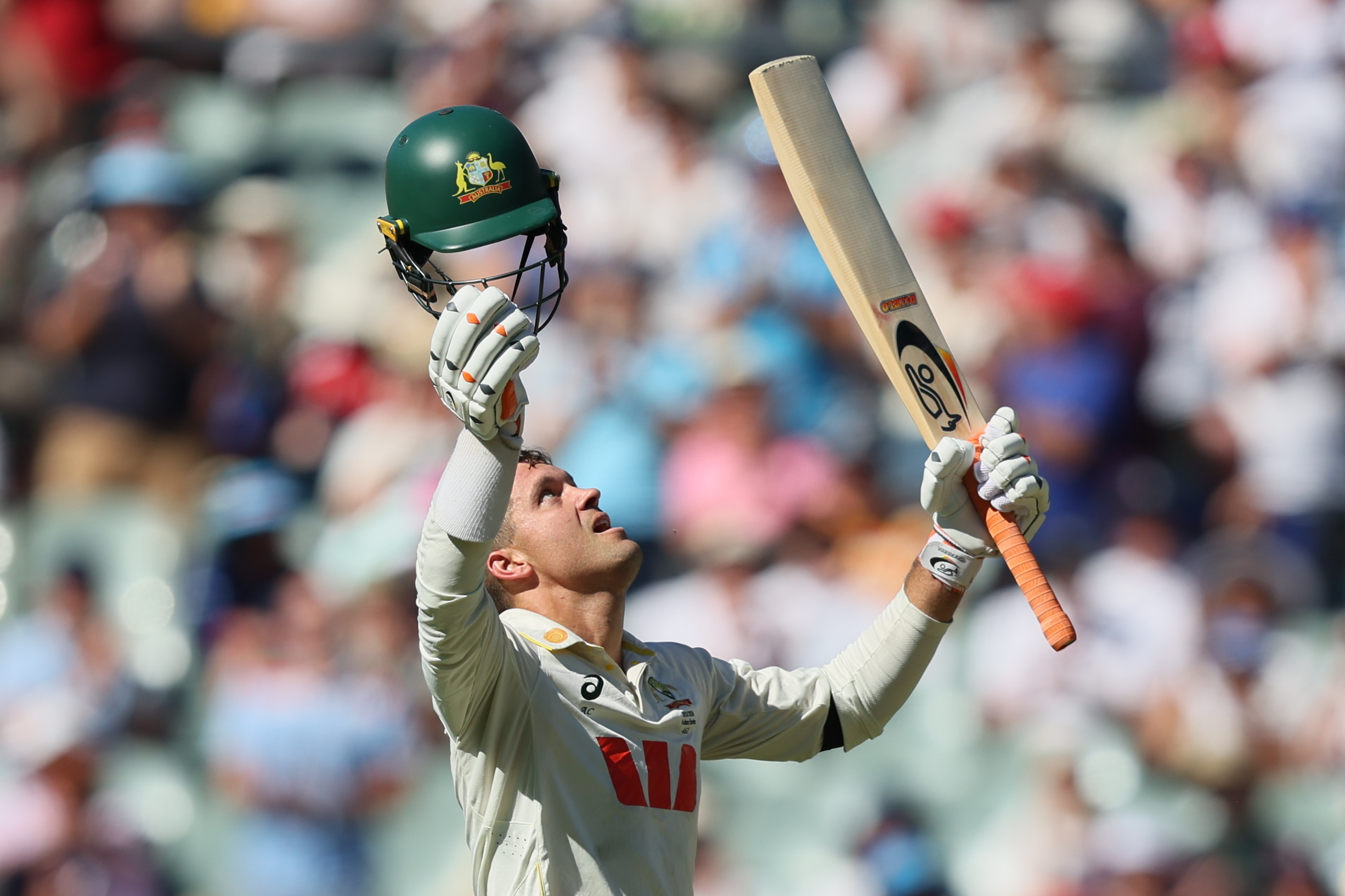 Australia's Alex Carey celebrates his century during play on day one of the third Ashes cricket test between England and Australia at the Adelaide Oval in Adelaide, Australia, Wednesday, Dec. 17, 2025. (AP Photo/James Elsby)