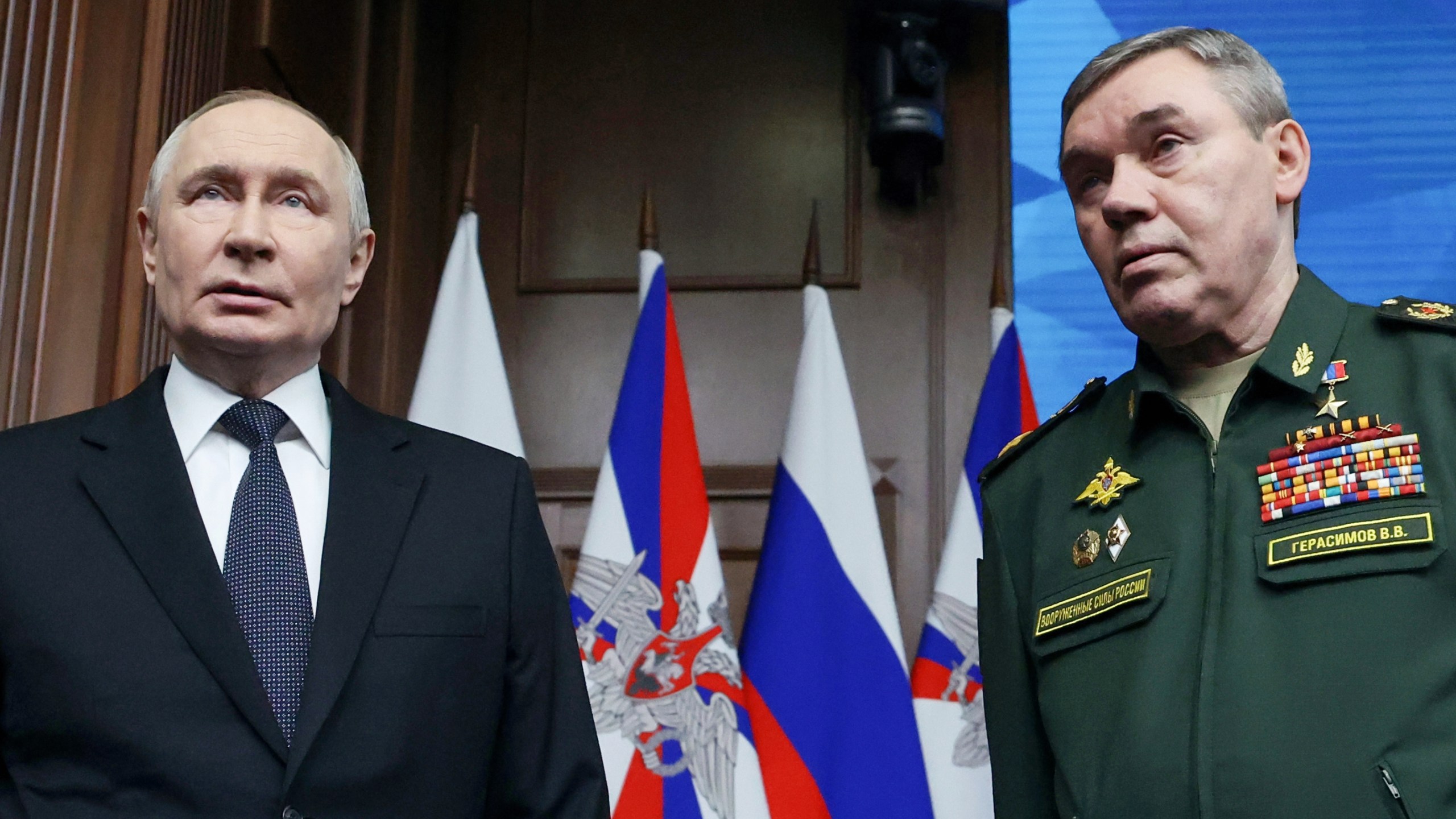 Russian President Vladimir Putin, left, and Russian Chief of General Staff Gen. Valery Gerasimov attend the annual board meeting of the country's Defense Ministry and awards soldiers in Moscow, Russia, Wednesday, Dec. 17, 2025. (Alexander Kazakov/Sputnik, Kremlin Pool Photo via AP)
