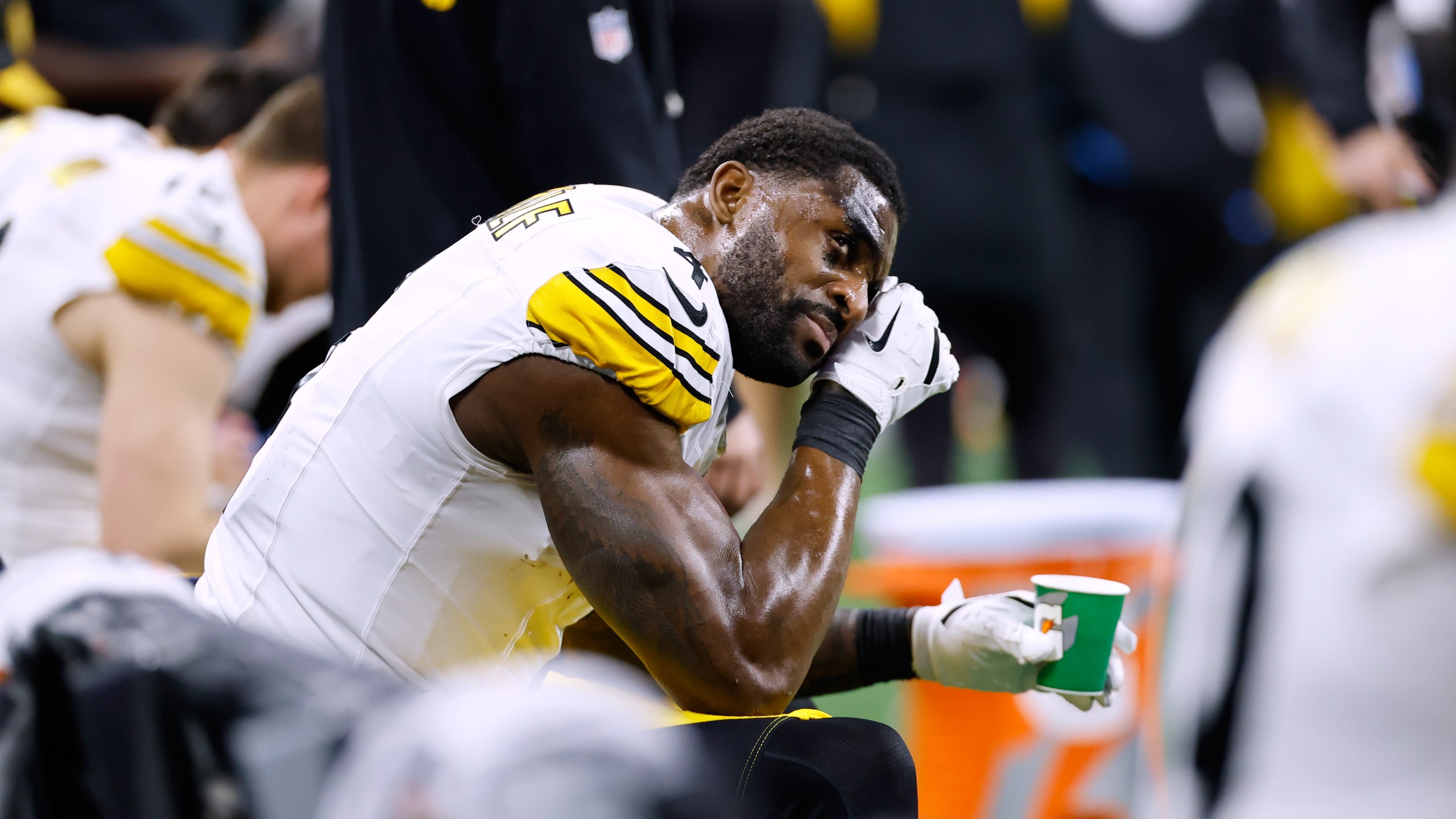 Pittsburgh Steelers' DK Metcalf wipes his face on the bench during the second half of an NFL football game against the Detroit Lions, Sunday, Dec. 21, 2025, in Detroit. (AP Photo/Rey Del Rio)